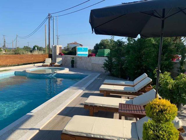 Sinodinos Deluxe Apartments Afytos Exteriör bild